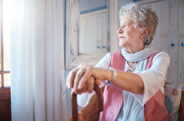 Senior woman, cane and thinking in home, nostalgic or contemplating old memory. Disability, support...
