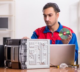 Young engineer repairing musical hi-fi system