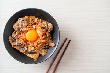 pork bulgogi rice bowl with kimchi and Korean pickled egg