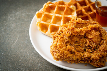 fried chicken waffle with honey or maple syrup