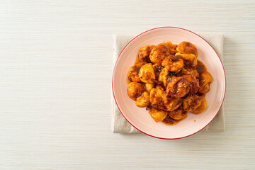 fried meatballs with spicy dipping sauce