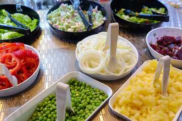 Colorful vegetable with sauce on plate in dinner salad bar healthy food
