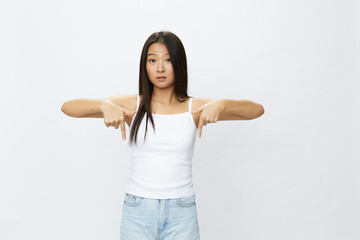 Asian woman hand signals, finger pointing facial skin problems, acne and inflammation, red rash and...