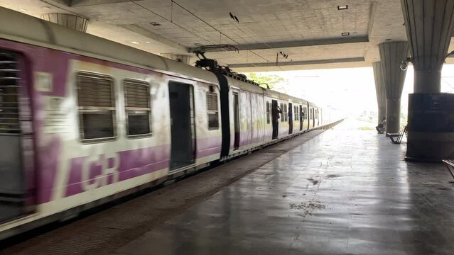 Kharghar, New Mumbai � November 14, 2022: View of Mumbai local train passes, Maharashtra, India.