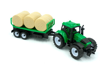 Toy colurfull tractor isolated on white background.