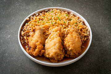 Korean instant noodles with fried chicken or Fried chicken ramyeon