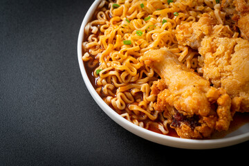 Korean instant noodles with fried chicken or Fried chicken ramyeon