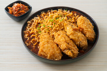 Korean instant noodles with fried chicken or Fried chicken ramyeon