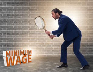 Concept of minimum wage with businessman