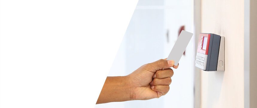 Proximity card reader door unlock, Hand security man using ID card on fingerprint scanning access control system for identity verification to open the door or for security safety or check attendance.