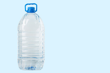 gallon of water in a big bottle,water delivery, clean drinking water on a blue background, copy...