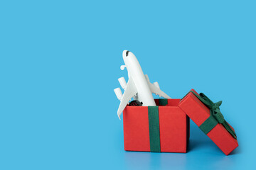 plane tickets gift for the holiday, airplane in a gift box