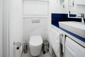 bathroom interior, modern design with toilet and washing machine