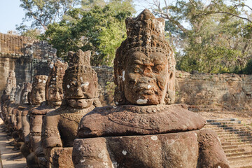 Old statues at Angkor Wat temple complex in Cambodia