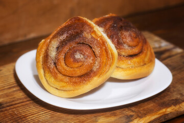 Sweet buns on a white plate