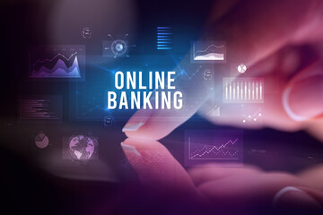 Finger touching tablet with business graphs and icons concept