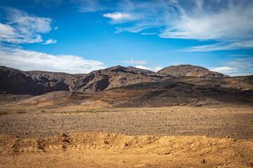 Fototapeta na wymiar stone desert near merzouga, morocco, desert, rock formation, north africa