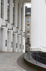 lamps on building wall with pillar