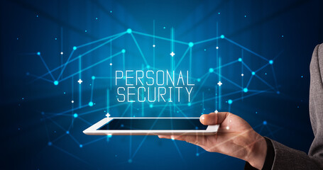 Person holding tablet, security concept