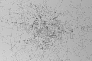 Map of the streets of Changsha (China) made with black lines on grey paper. Top view. 3d render, illustration