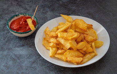 Fried potato wedges. Fast food. isolated on white