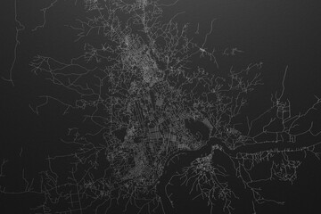 Street map of Bangui (Central African Republic) on black paper with light coming from top