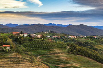 Fototapeta na wymiar Landscape of Solovenian vineyards, hills and mountains in autumn. Šmartno, Brda Goriska region, Slovenia.