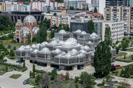 Elevated view of National Library of Kosovo, in Pristina, built in Brutalist style, domes, concrete