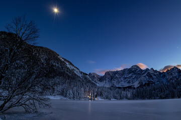 Winter moonlight on the lakes of Fusine