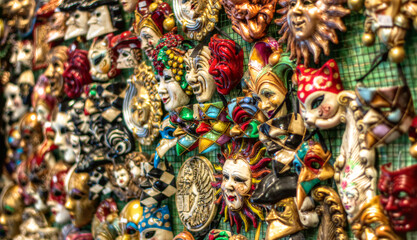 the colors of the masks hanging on a wall