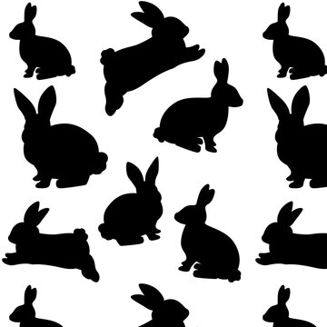 Seamless pattern with silhouette of rabbits