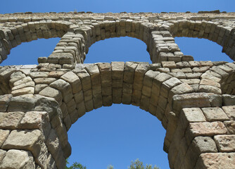 Fototapeta na wymiar Detail of the Roman Aqueduct in Segovia. (2nd century AD). Spain. Unesco World Heritage.