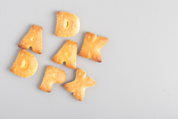 English letter bread snack on gray background