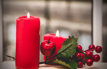 Christmas decoration with candles at home. merry christmas and new year concept