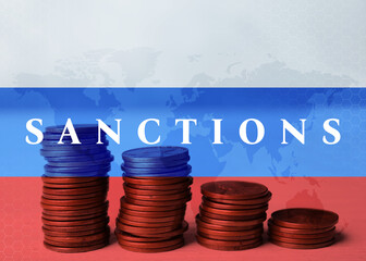 Economic sanctions against Russia because of invasion in Ukraine. Stacked coins on table,...