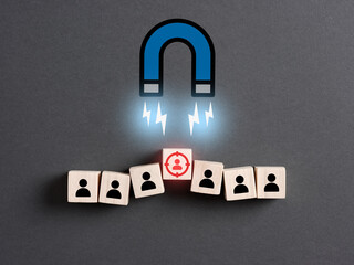 Magnet selects target customer from the row of clients.
