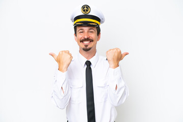 Airplane caucasian pilot isolated on white background with thumbs up gesture and smiling