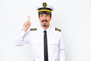Airplane caucasian pilot isolated on white background intending to realizes the solution while lifting a finger up