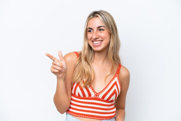 Young caucasian woman isolated on white background pointing finger to the side and presenting a product