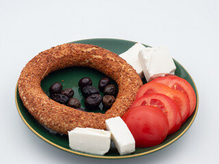 breakfasts on green plate, white background, isolated 
