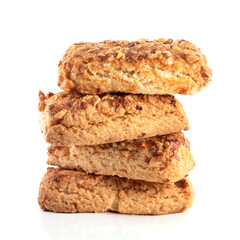 stack oatmeal cookies cinnamon with nuts isolated on white background