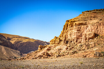 Fototapeta premium rock formation, canyon, valley of roses, morocco, oasis, river, m'goun, high atlas mountains, north africa,
