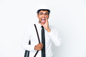 Architect brazilian man with helmet and holding blueprints shouting with mouth wide open