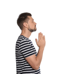 Man with clasped hands praying on white background