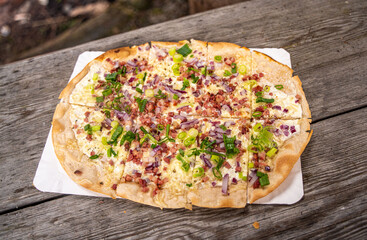 delicious tarte with bacon, onions and cheese