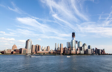 Lower Manhattan Skyline And Ferry Boats