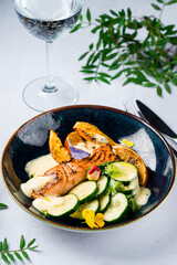 Salmon steak with vegetables. Freshly grilled. Healthy dinner. Mediterranean Diet.