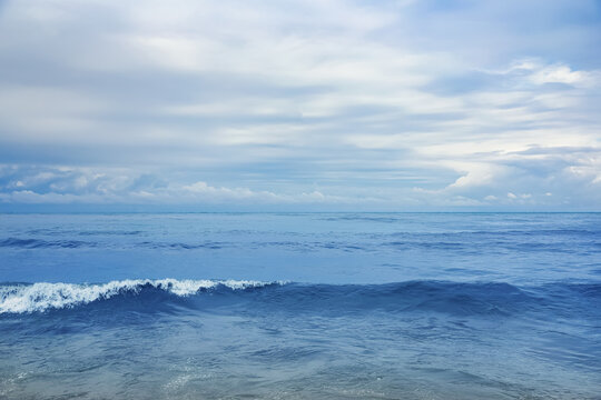 Picturesque view of sea with waves on cloudy day © New Africa
