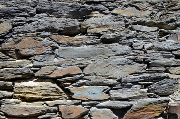 Background of a natural stone wall.