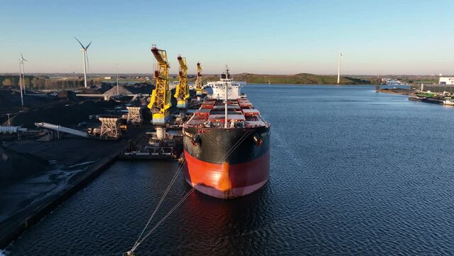 Coal storage transhipment for power stations in Germany, bulk logistics storage and loading of raw energy materials. Aerial. Global warming CO2 emissions, fossil energy supply.